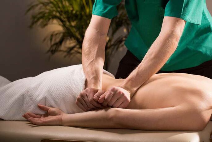 Massage of the patient with osteochondrosis